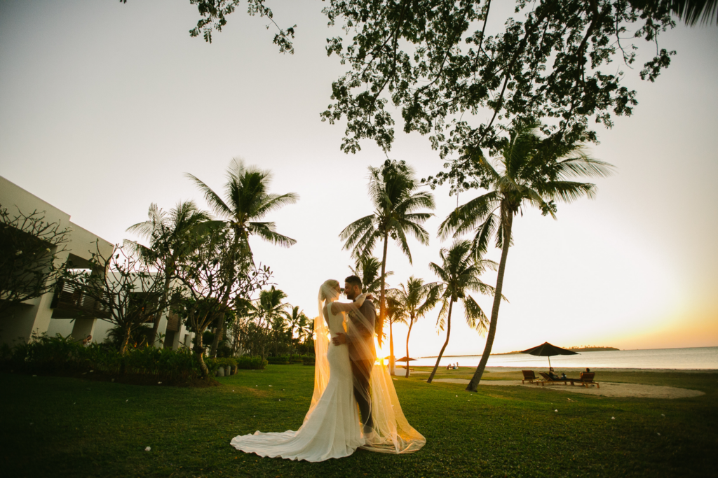 White wedding photoshoot at Hilton Fiji Beach Resort and Spa by Cheer Wedding Photography
