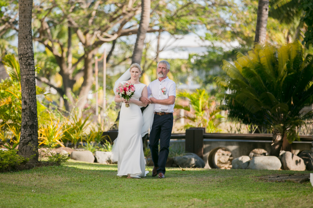 White wedding photoshoot at Hilton Fiji Beach Resort and Spa by Cheer Wedding Photography