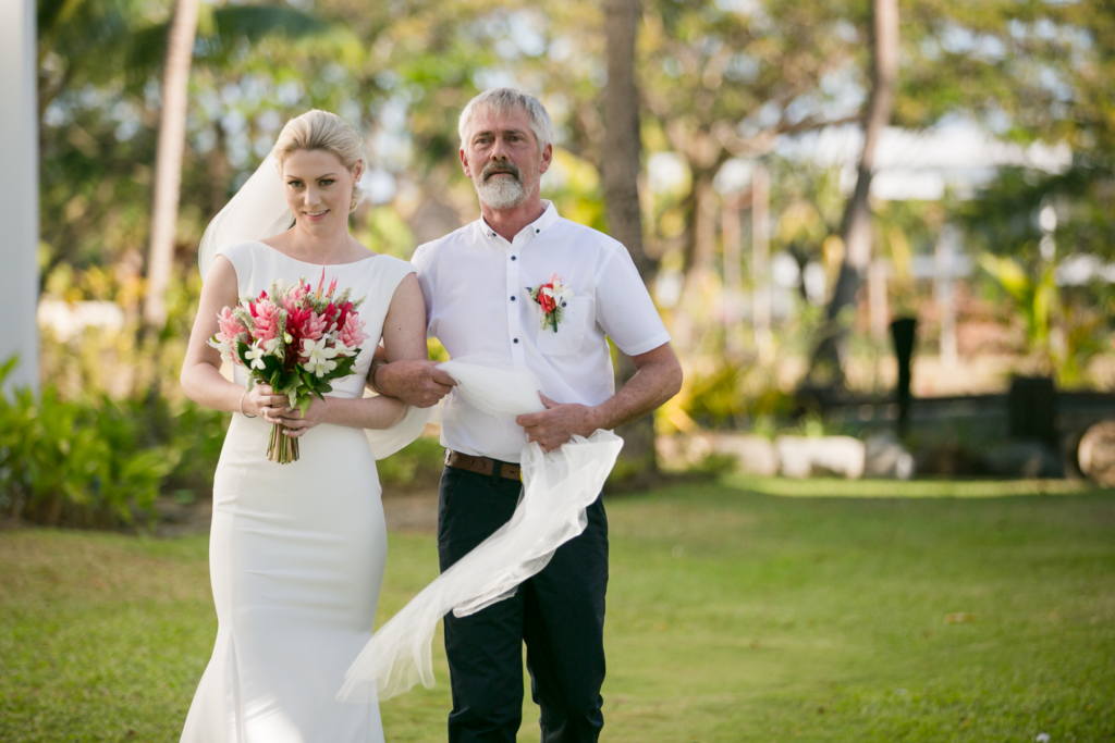 White wedding photoshoot at Hilton Fiji Beach Resort and Spa by Cheer Wedding Photography